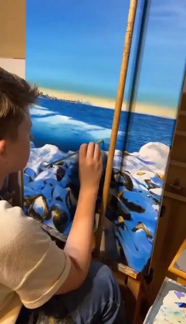 Young student practicing painting techniques